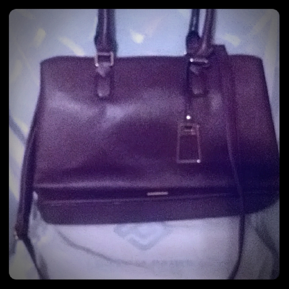 Burgundy purse with Zipper by Aldo